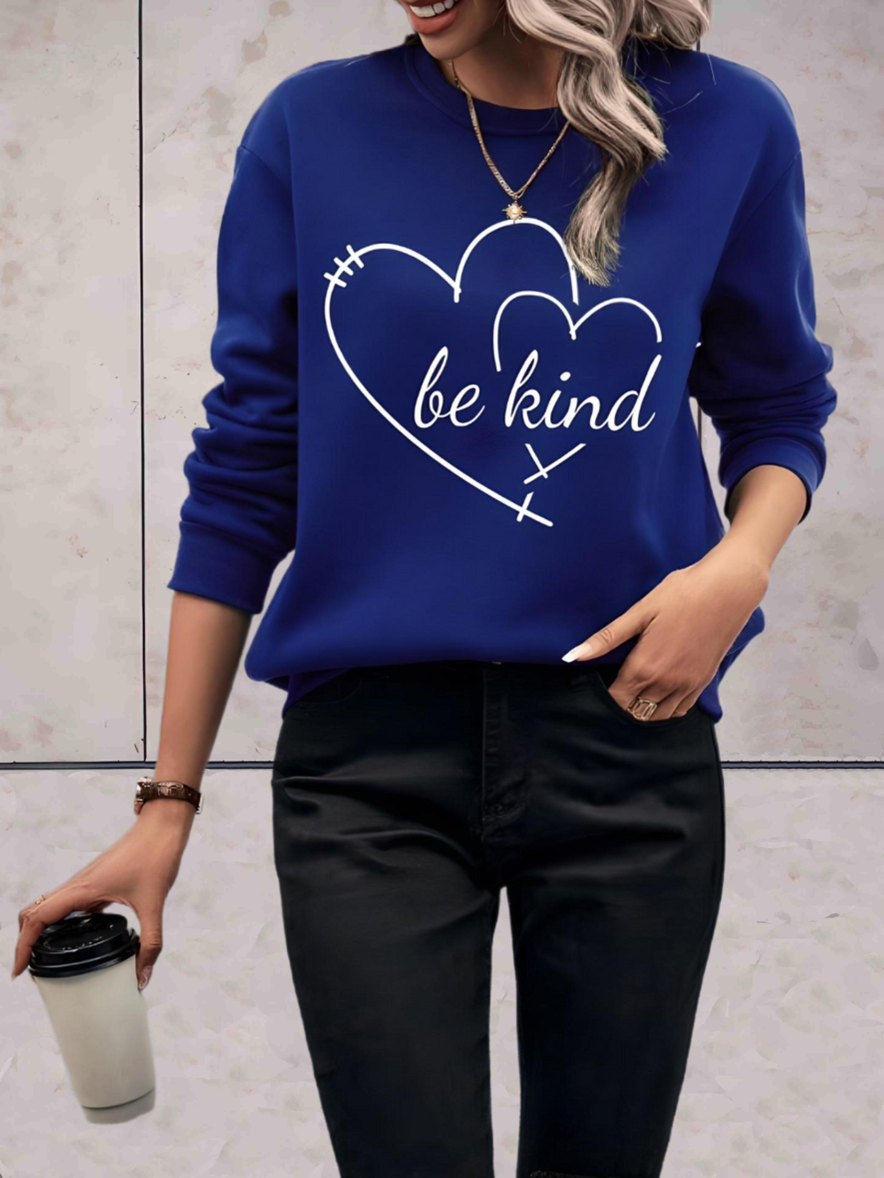 Armari - Blauwe oversized sweater met be kind statement en twee hartjes design - Sky-Sense