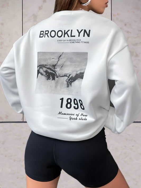 Jules - Oversized sweater effen voor en brooklyn statement met fotoprint op de achterkant - Sky-Sense