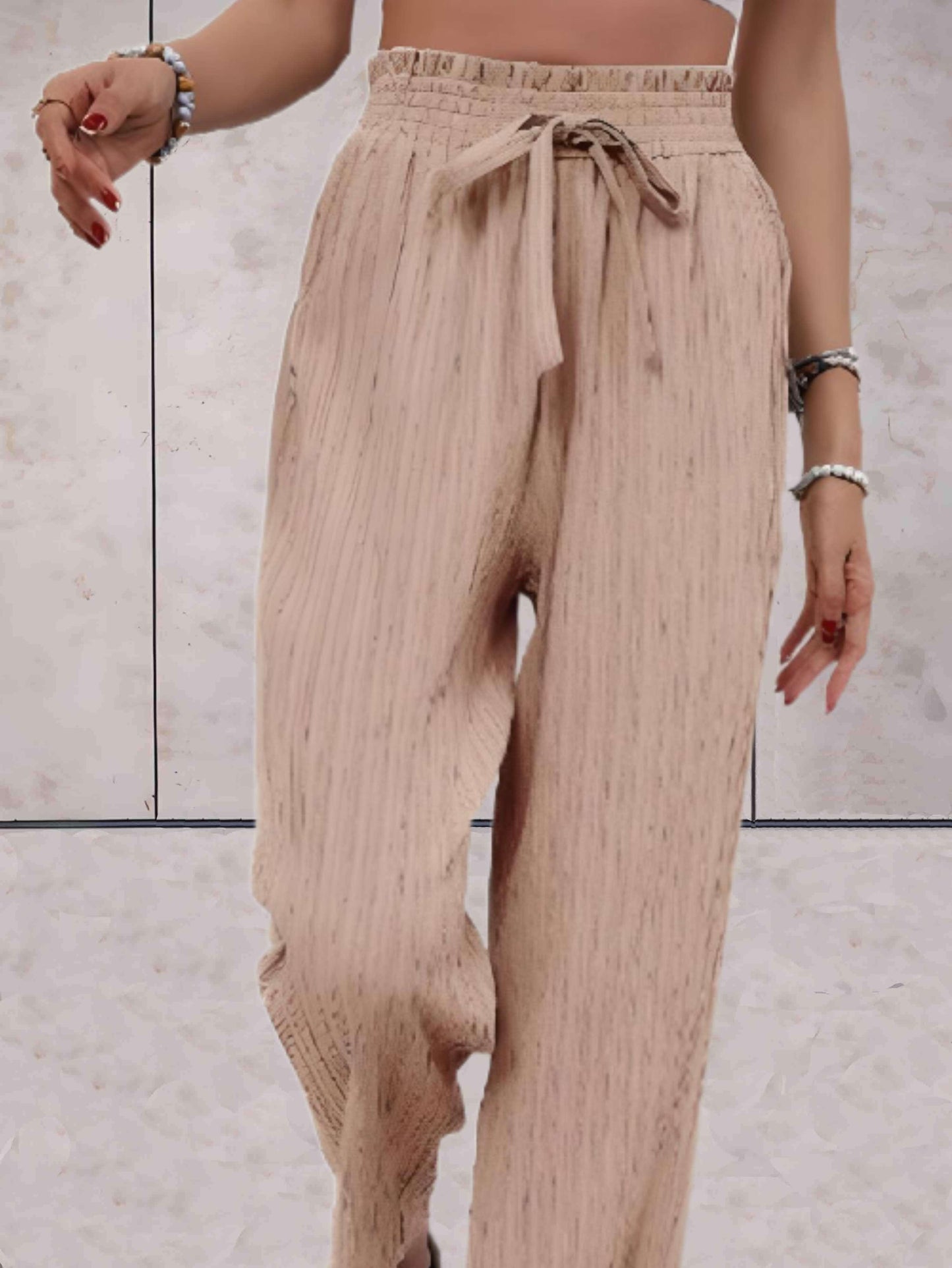 Aveda - High-waisted broek met geribbeld design en wijde pijpen en striklint - Sky-Sense