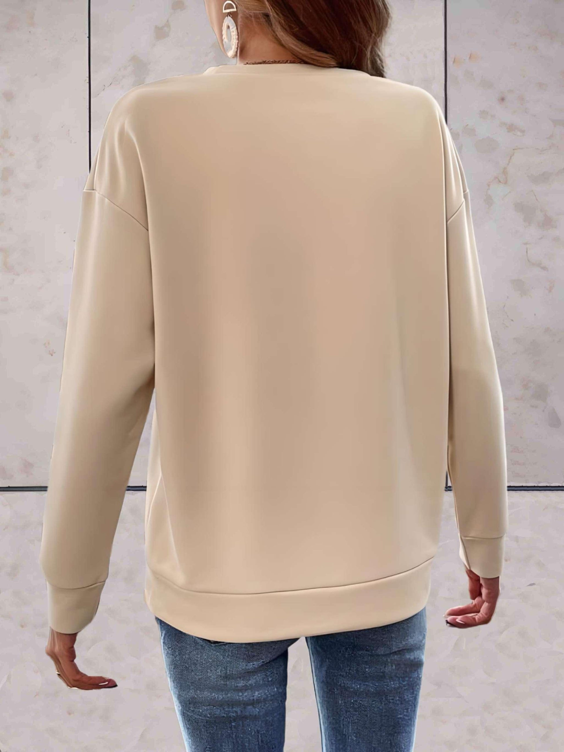 Farah - Beige sweater met kwastjes vooraan - Sky-Sense