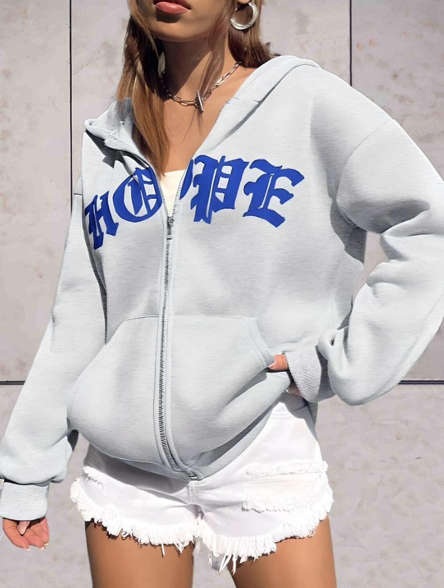 Reese - oversized hoodie met statement print, ingebouwde rits en twee zijzakken - Sky-Sense
